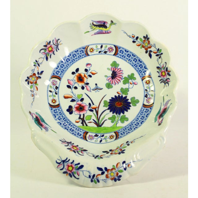 A very beautiful shell shaped serving dish / candy bowl Decorated with blue transfer printed under-glaze, then carefully...