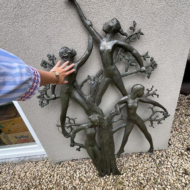 Jozef (Jos) van Acker ‘Ode to Woman (137cm)'. Bronze in appearance, this green patina wall sculpture was made in resin by...