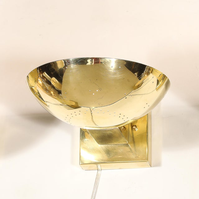 This remarkable set of four polished brass sconces is designed by Paavo Tynell, one of Finland's most celebrated mid-...