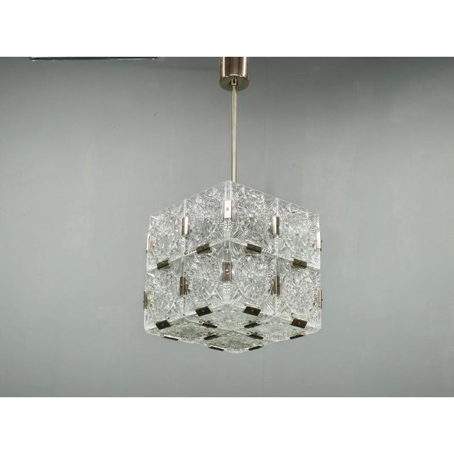Exceptional vintage crystal glass pendant light produced in kamenicky senov, czechoslovakia, during the 1970s. The pendant...