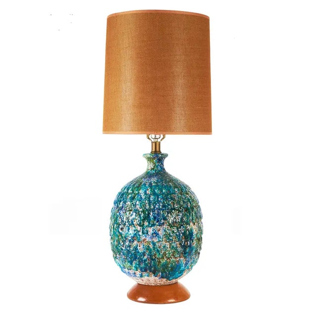 Impressively large mid-century modern fat lava glazed ceramic table lamp. Molten-like blue glaze with with green and white...