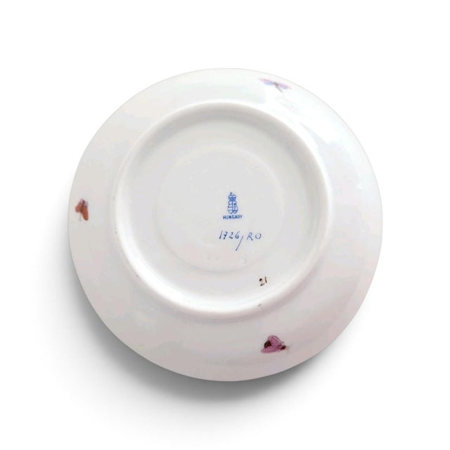 The Herend Rothschild Bird 5.25" scalloped 24K gold edge saucer is a vintage porcelain piece. This multicolor saucer...