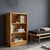 Bookcase in poplar veneer, the top is made of back-treated glass. Decent condition. This piece is attributed to the...