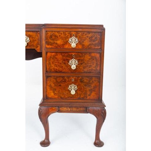 Stunning burr walnut Queen Anne style desk of exceptional quality and character Raised on elegant cabriole legs...