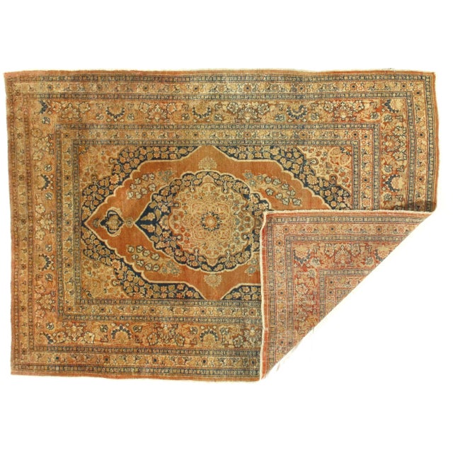 Genuine antique Tabriz HAJJALILI. Handmade form lamb's wool on a cotton foundation. Very decorative colors.