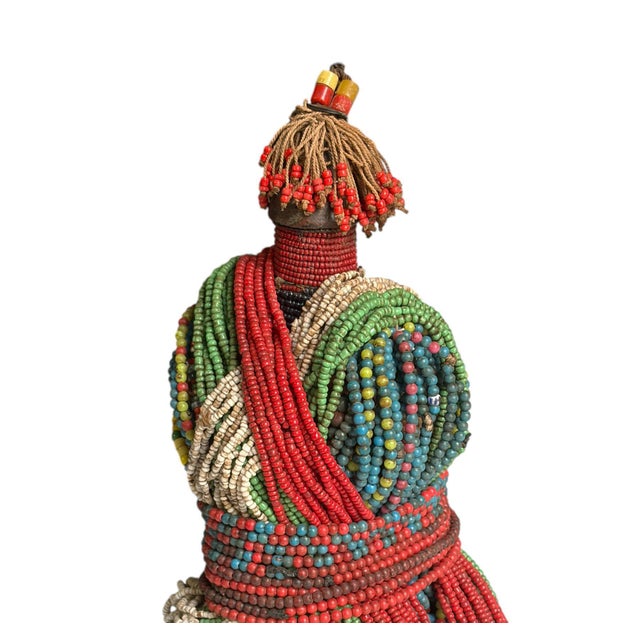 Superb vintage African Fali Namji fertility doll decorated with multiple layers of trade glass beads and cowrie shells,...