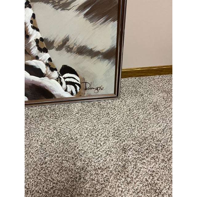 Beautiful snow leopard painting that we received as a house warming gift. We enjoyed it for many years but decor changed...