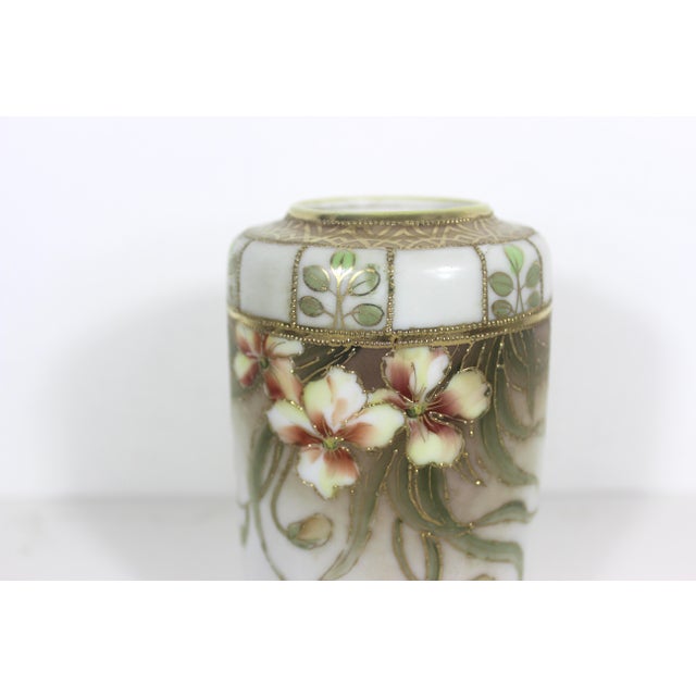 Antique (circa 1911) Nippon porcelain hand painted vase with flowers and moriage (raised) gold detail. Minimal wear, some...
