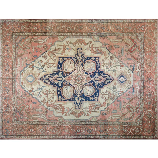 A handsome and highly decorative late 19th-century Persian Serapi carpet, circa 1880, distinguished by its spacious...