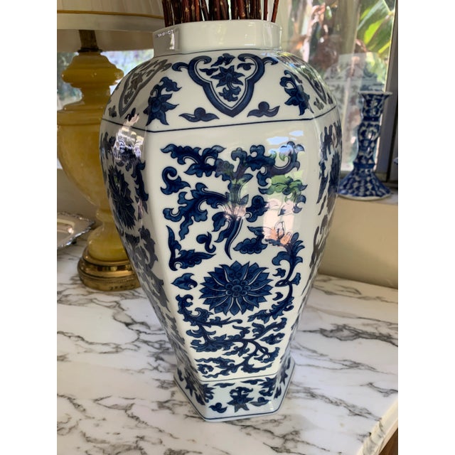 Here we have a beautiful blue and white porcelain Asian vase. Perfect condition, I find no flaws. No hallmark, but I'm...