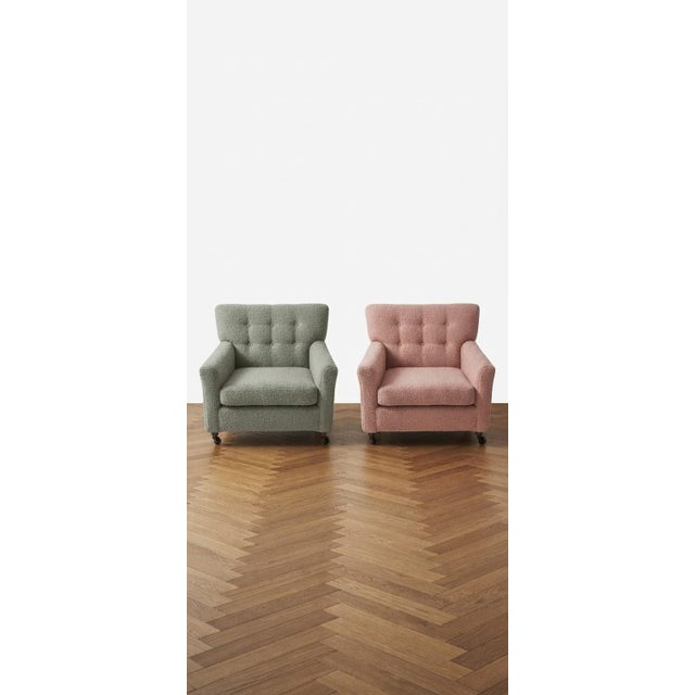 A delightful and cozy matching pair of fully refurbished Hungarian vintage retro lounge armchairs, upholstered in...