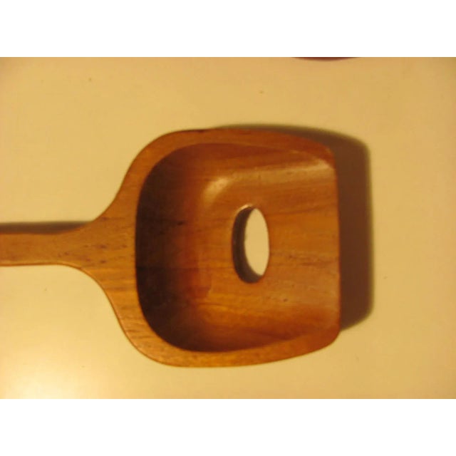 Very nice pair of teak salad utensils. Made of teak. Made in Sweden. They measure 3.5" wide and 15" long. excellent...