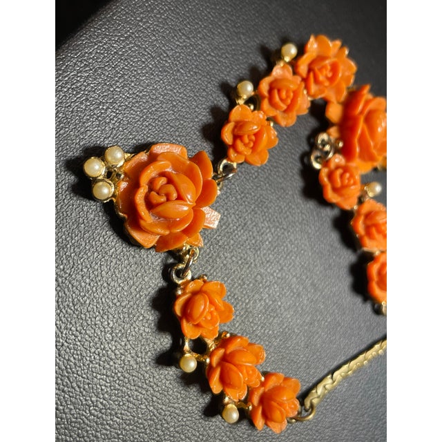 Mid Century Modern Carved Floral Faux Coral and Pearls on Textured Brass Chevron Chain and Orange Push Clasp For Sale - Image 4 of 7