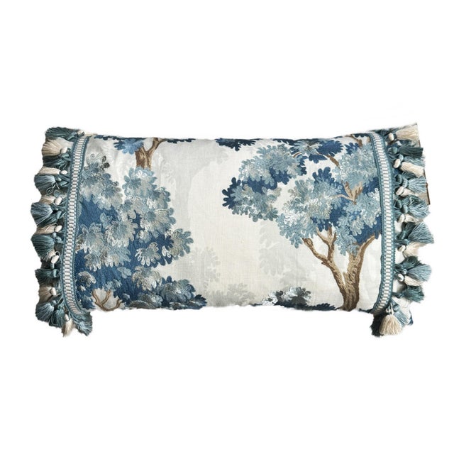 This lovely embroidered fabric with it 's leafy towering trees, is light and airy against an off white ground. Shades of...
