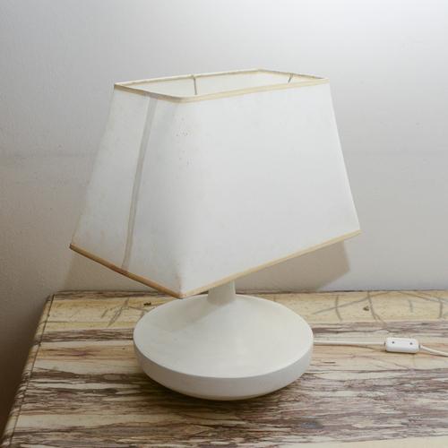 This table lamp is a refined example of atmospheric lighting, where elegant materials meet a classic, timeless silhouette....