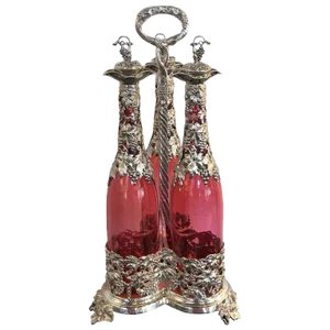 19th Century English Silver Plate and Cranberry Glass Three-Bottle Tauntless