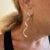 Platinum Mid 20th Century Harry Winston Diamond Twisted Long Hanging Drop Platinum Earrings, A Pair For Sale - Image 8 of 14