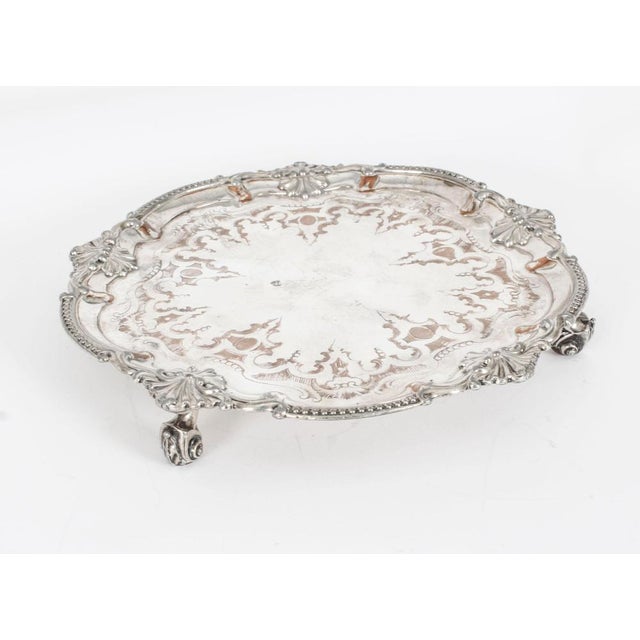 This is an exquisite English antique old Sheffield plate salver, circa 1780 in date. The elegant raised pie crust border...