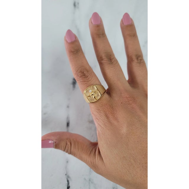 ♥ Product Summary ♥ Main Stone: Diamond Approx. Carat Weight: .05cttw Band Material: 14k Yellow Gold Stone Cut: Round...
