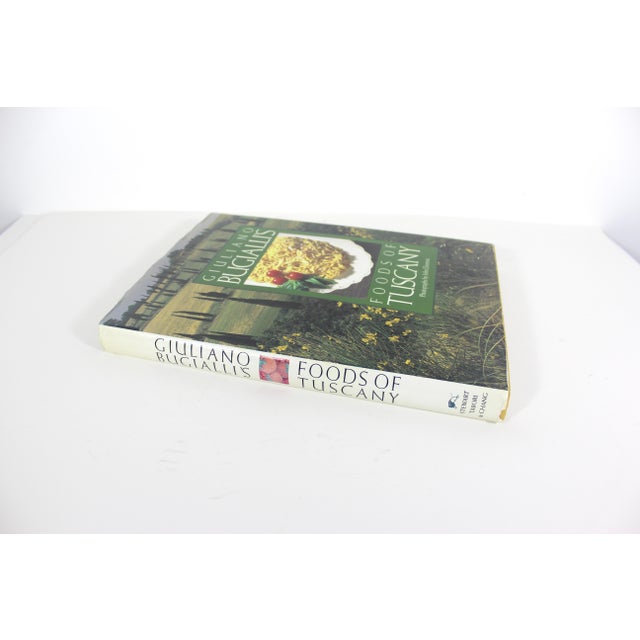 1992 Giulliano Bugialli’s Foods of Tuscany Excellent vintage condition with slight yellowing pages and wear. The Hard...