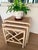 Mid-Century Palm Beach Regency design trio of nesting tables. Elegant geometric Chinese Chippendale style open work cross-...