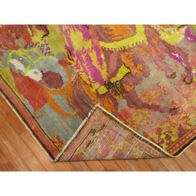 One of a kind mid-20th century decorative Pictorial Double Horse rug in florescent colors. 3 men riding on their horses...