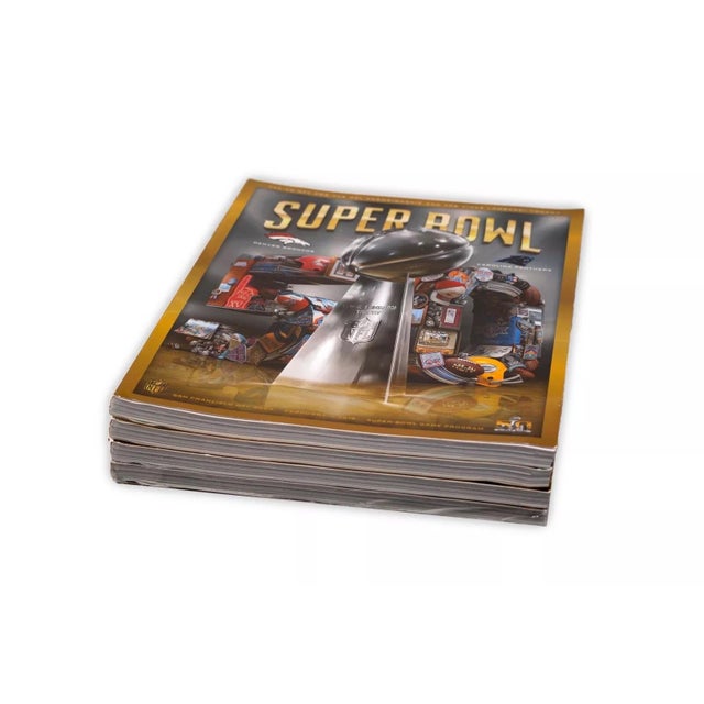 A set of 4 Superbowl 50 official game program magazines. February 7th, 2016, Levi’s Stadum in San Francisco Bay Area. The...