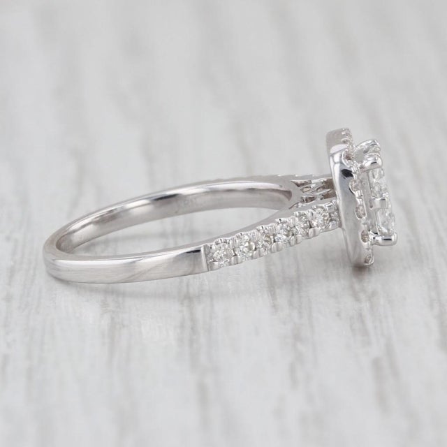 Gemstone Information: - Natural Diamonds - center Total Carats - 0.48ctw Cut - Princess Color - G - H Clarity - VS2 - I1 -...