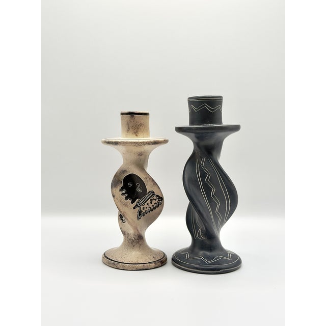 This pair of vintage twisted soapstone candlestick holders brings a striking sculptural presence to any interior. Hand-...