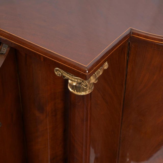 Sideboard, buffet. Sideboard from Northern Germany, circa 1830, Biedermeier style, pyramid-shaped mahogany, two full...