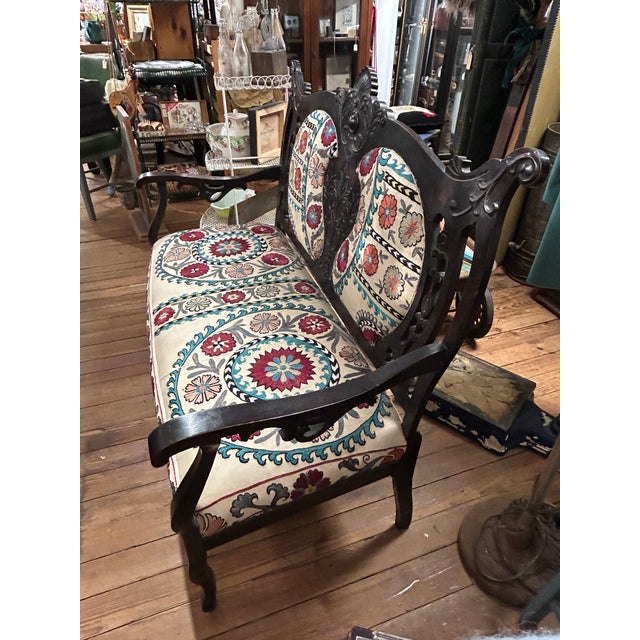 Victorian Antique Victorian Style Carved Mahogany Loveseat With Suzani Textile Upholstery For Sale - Image 3 of 18