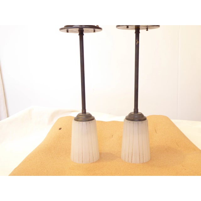 Mid 20th Century West German glass lights with updated wiring and darkened brass hardware, use up to 75 watts Edison base...