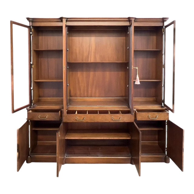 This is a regency style faux bamboo burl wood cabinet with wonderful storage! It is most likely burl maple. The nice slim...