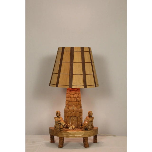 Interesting hand carved maple lamp. Intricate detailing creating an substantial sculpture. and great example of Adirondack...
