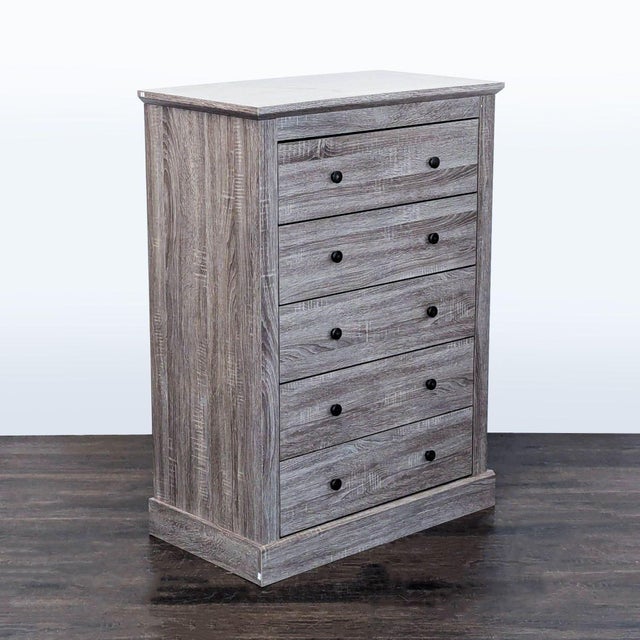 This Modus Furniture dresser features a modern gray wood finish and five spacious drawers for easy organization. Its...