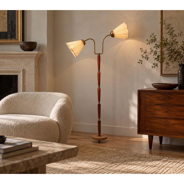Swedish Mid-Century Modern, Adjustable Floor Lamp, Wood, Brass, Pleated Shades, Sweden, 1950s A sculptural floor lamp...