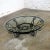 Awesome round rustic Spanish Revival Style hand wrought iron coffee table with 3/8 in. thick 48-inch round glass top....