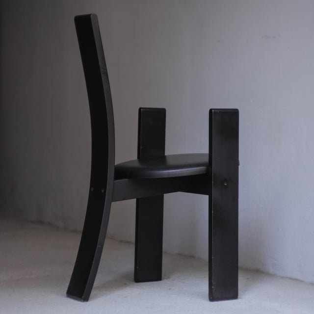 1960s chair in black lacquered wood. Made in Italy by Poggi. Designed by Vico Magistretti. In good overall condition, with...