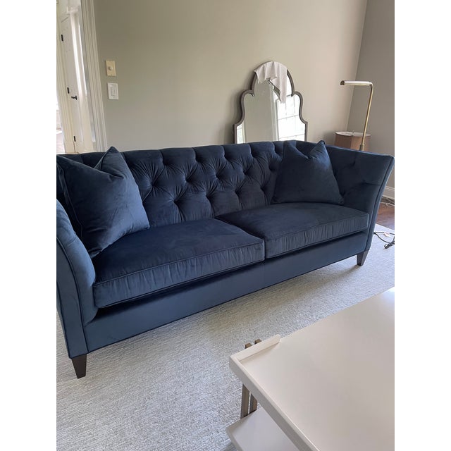 Elegant Ethan Allen Shelton sofa upholstered in a rich deep blue velvet. The sofa has classic diamond tufting, curved...