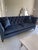 Elegant Ethan Allen Shelton sofa upholstered in a rich deep blue velvet. The sofa has classic diamond tufting, curved...