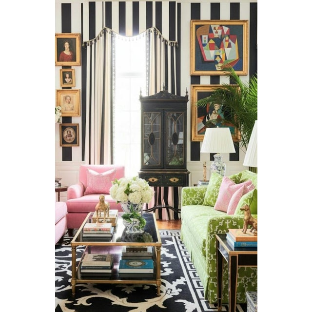 An incredible Regency pagoda glass front 2 drawer curio cabinet in the style of Habersham or Jasper. The cabinet features...