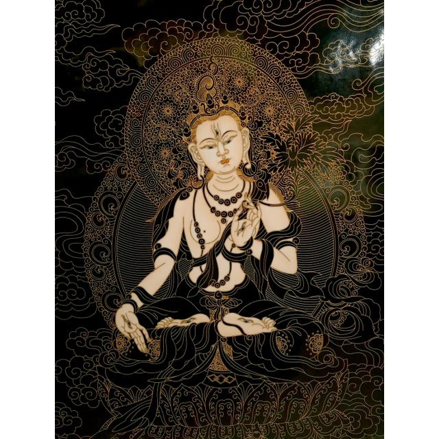 Chinese framed porcelain Buddhist temple plaque White Tara, a finely drawn depiction of White Tara in black and gold,...