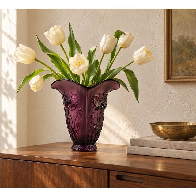 Rich amethyst glass and sculptural poppy blossoms give this vase a striking presence. Raised flowers, buds, and foliage...