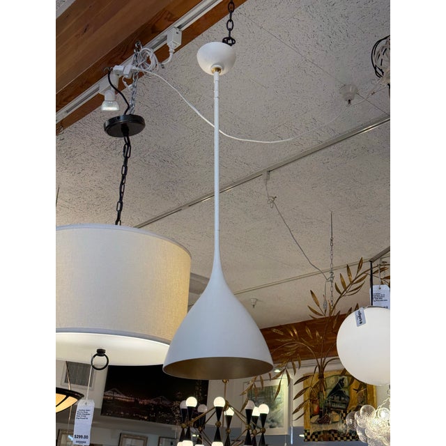 Design Plus Gallery presents the Agnes by AERIN for Williams-Sonoma. The fixture boasts a minimalist, bell-shaped design...