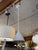 Design Plus Gallery presents the Agnes by AERIN for Williams-Sonoma. The fixture boasts a minimalist, bell-shaped design...