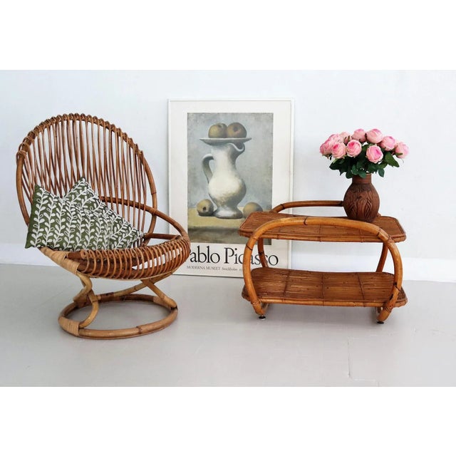 Beautiful handcrafted Mid-Century shelf or bar shelf made of bamboo in organic style during the 1960s-1970s, Italy. The...