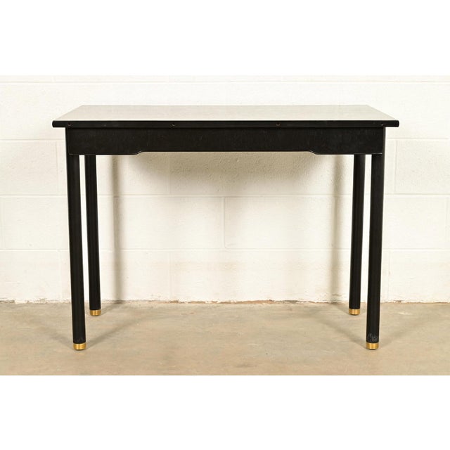 An exceptional mid-century modern Hollywood Regency style console table or writing desk By John Widdicomb USA, Circa 1950s...