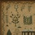 Victorian Scottish Sampler, with a house and a thistle motif. The sampler is worked in silk threads on a linen ground, in...