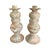 A striking monumental-scale pair of vintage terracotta candlesticks distinguished by their substantial proportions,...