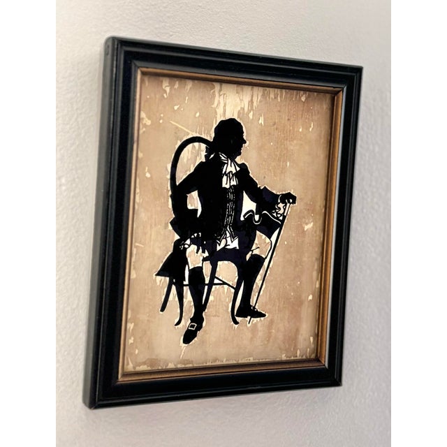 Vintage framed silhouette of Governor Winthrop, made from an original hand cutting and reverse painted with enamel onto...